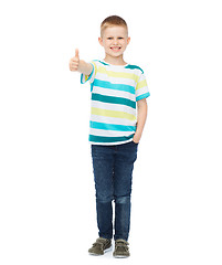 Image showing little boy in casual clothes showing thumbs up