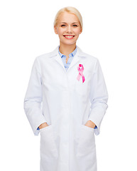 Image showing female doctor with breast cancer awareness ribbon