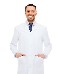 Image showing smiling male doctor in white coat