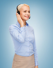 Image showing friendly female helpline operator