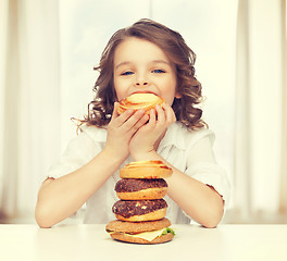 Image showing girl with junk food