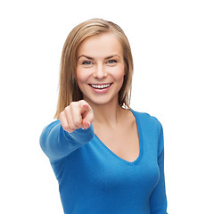 Image showing smiling student pointing finger at you