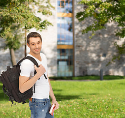 Image showing travelling student with backpack and book