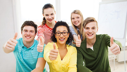 Image showing smiling students at school showing thumbs up