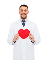 Image showing smiling male doctor with red heart