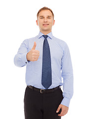 Image showing smiling businessman showing thumbs up