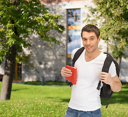 Image showing travelling student with backpack and book