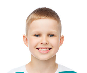 Image showing smiling little boy over white background