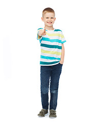 Image showing Little boy in casual clothes pointing his finger