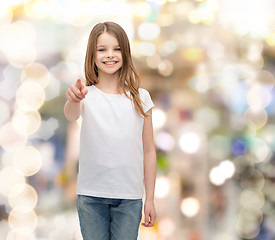 Image showing little girl in blank white t-shirt pointing at you