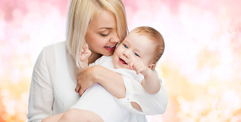 Image showing happy mother with smiling baby