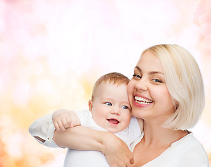 Image showing happy mother with smiling baby