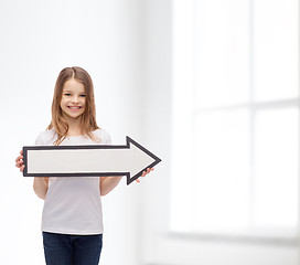 Image showing smiling girl with blank arrow pointing right