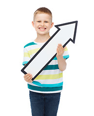 Image showing smiling little boy with blank arrow pointing up