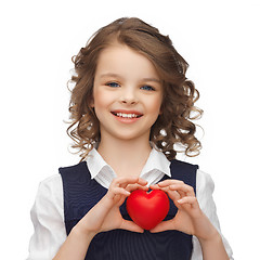 Image showing girl with small red heart