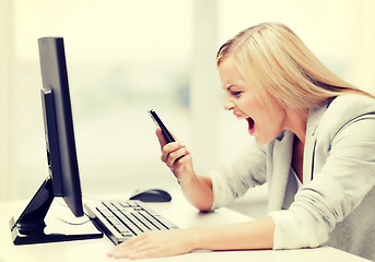 Image showing angry woman with phone