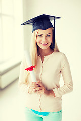 Image showing student in graduation cap with certificate