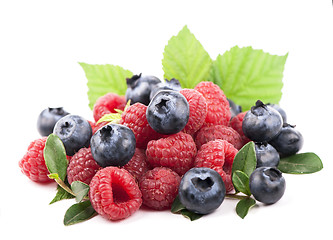 Image showing Many blueberries, raspberries. Isolated white