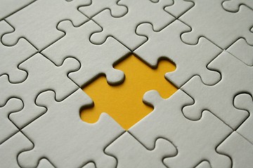 Image showing Final yellow jigsaw piece