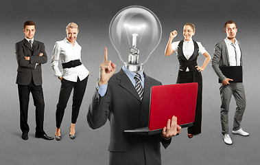 Image showing Business Team With Lamp Head