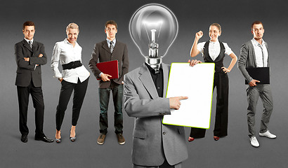 Image showing Business Team With Lamp Head