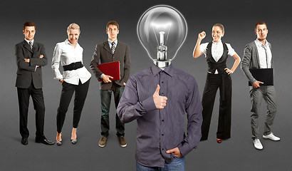 Image showing Business Team With Lamp Head