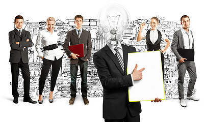 Image showing Business Team With Lamp Head