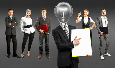 Image showing Business Team With Lamp Head