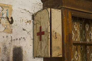 Image showing Old first aid kit among the cobwebs