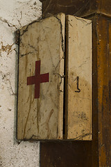 Image showing Old first aid kit among the cobwebs