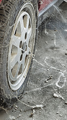 Image showing 80’s tire among cobwebs