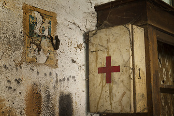 Image showing Old first aid kit among the cobwebs