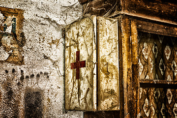 Image showing Old first aid kit among the cobwebs