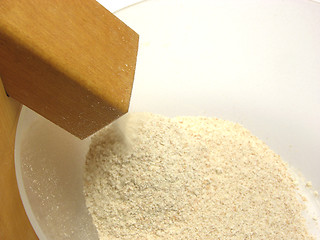 Image showing Flour mill on its work grounding meal