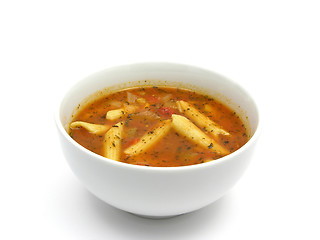 Image showing Noodle soup with tomatoes and herbs on white