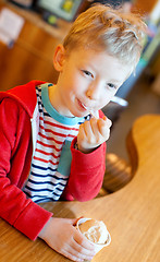 Image showing kid eating ice-cream