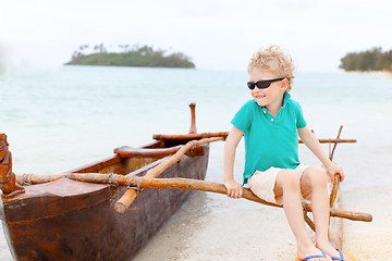 Image showing kid at outrigger canoe