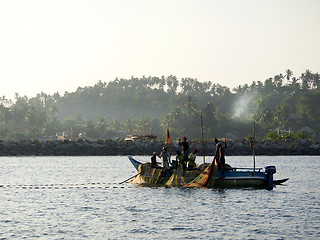 Image showing Fishermen at the Indian ocean