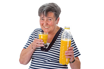 Image showing Elderly woman with orange juice