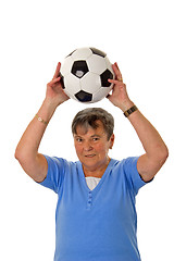 Image showing Senior woman throwing a ball