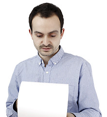 Image showing Man holding a paper