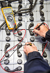 Image showing Battery check with multimeter