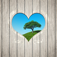 Image showing wooden heart with a tree