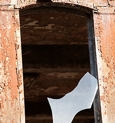 Image showing Wall of old destroyed house with broken windows