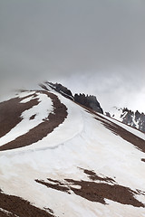 Image showing Snowy mountains before rain