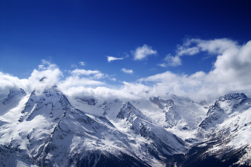 Image showing Snowy mountains at sun day