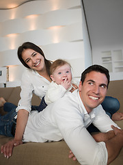 Image showing happy young family at home