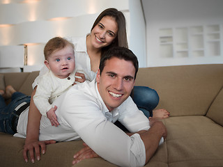 Image showing happy young family at home