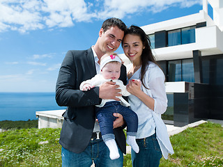 Image showing happy young family at home