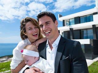 Image showing happy young family at home